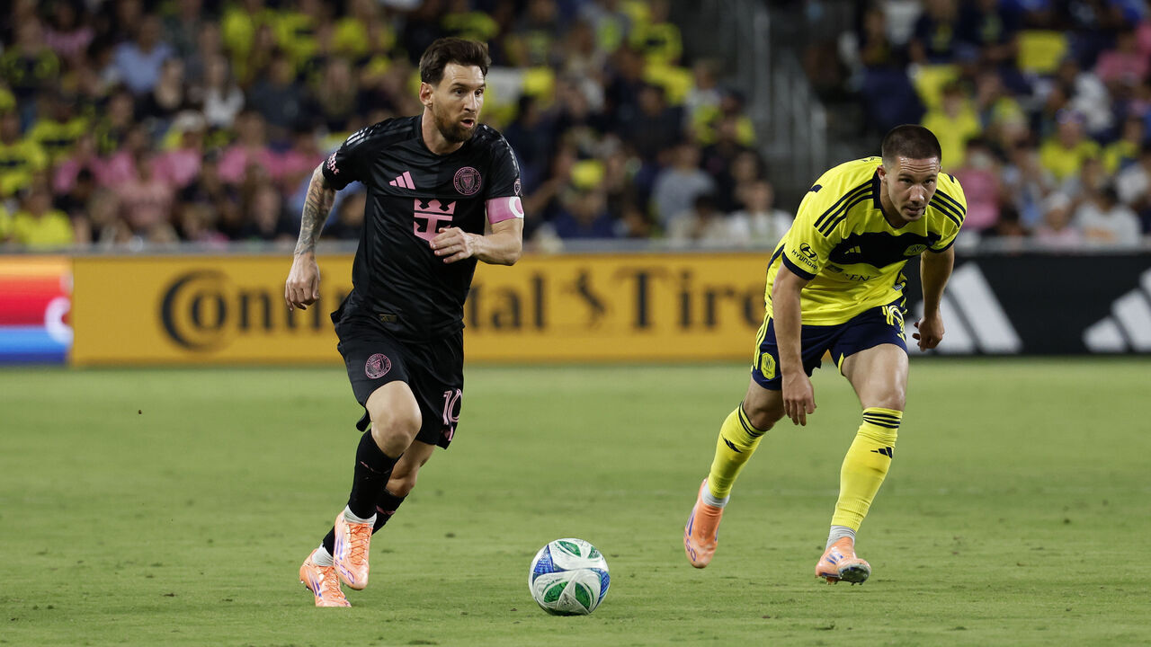 NASHVILLE, TN - OCTOBER 18: Inter Miami forward Lionel Messi #10 makes a move in front of Nashville SC midfielder Alex Muyl #19 during a match between Nashville SC and Inter Miami, October 18, 2025 at GEODIS Park in Nashville, Tennessee.