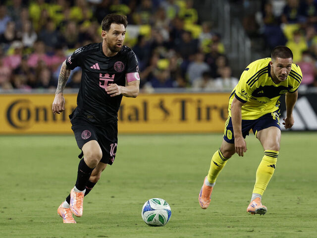NASHVILLE, TN - OCTOBER 18: Inter Miami forward Lionel Messi #10 makes a move in front of Nashville SC midfielder Alex Muyl #19 during a match between Nashville SC and Inter Miami, October 18, 2025 at GEODIS Park in Nashville, Tennessee.
