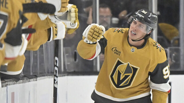 LAS VEGAS, NEVADA - OCTOBER 18: Mitch Marner #93 of the Vegas Golden Knights celebrates with teammates after a goal during the second period against the Calgary Flames at T-Mobile Arena on October 18, 2025 in Las Vegas, Nevada.