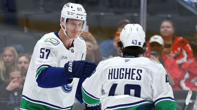 WASHINGTON, DC - OCTOBER 19: Tyler Myers #57 of the Vancouver Canucks celebrates his goal against the Washington Capitals during the first at Capital One Arena on October 19, 2025 in Washington, DC.