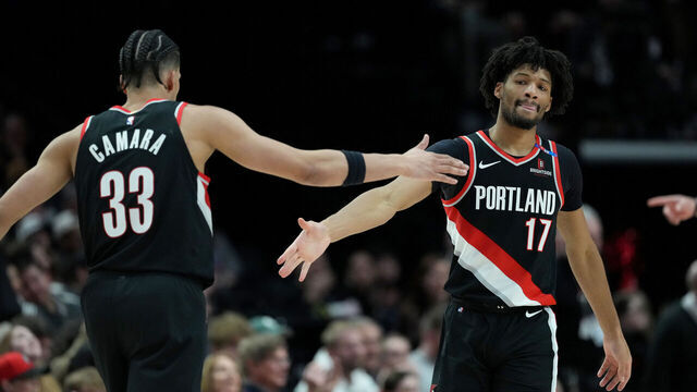 PORTLAND, OREGON - MARCH 19: Toumani Camara #33 and Shaedon Sharpe #17 of the Portland Trail Blazers high five during the second half at Moda Center on March 19, 2025 in Portland, Oregon.