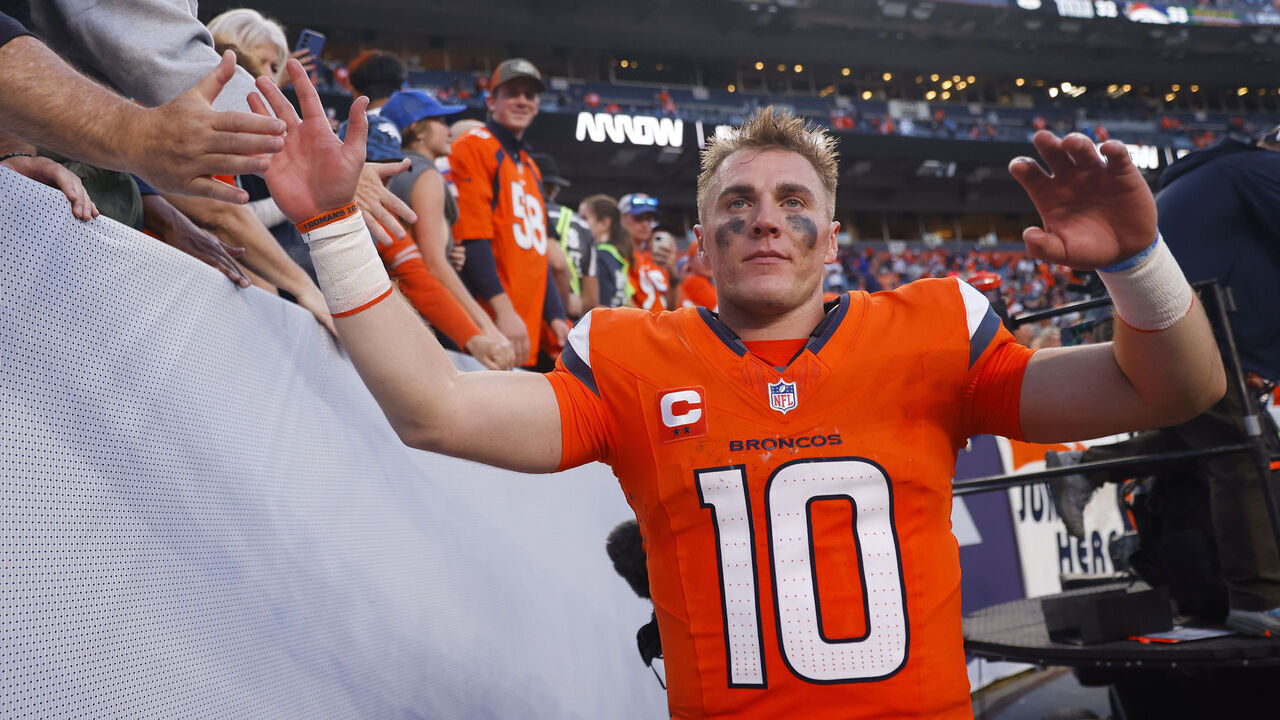 DENVER, COLORADO - OCTOBER 19: Bo Nix #10 of the Denver Broncos celebrates with fans after defeating the New York Giants 33-32 at Empower Field At Mile High on October 19, 2025 in Denver, Colorado.