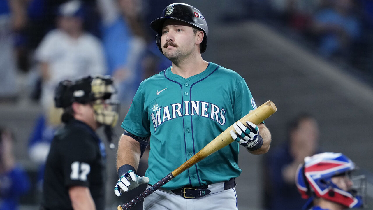 TORONTO, ONTARIO - OCTOBER 19: Cal Raleigh #29 of the Seattle Mariners looks on after striking out during the first inning against the Toronto Blue Jays in game six of the American League Championship Series at Rogers Centre on October 19, 2025 in Toronto, Ontario.