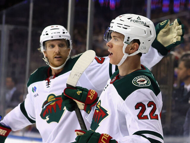 NEW YORK, NEW YORK - OCTOBER 20: Danila Yurov #22 of the Minnesota Wild (r) celebrates his game-winning goal, the first of his NHL career, against the New York Rangers at Madison Square Garden on October 20, 2025 in New York City. The Wild defeated the Rangers 3-1.