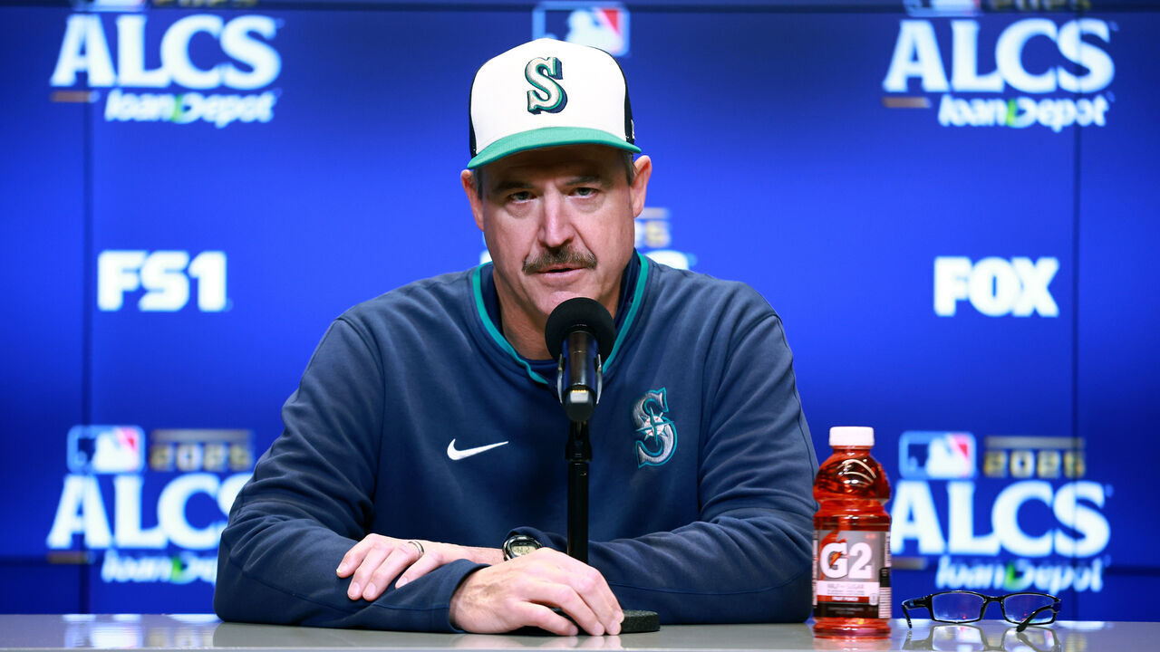 TORONTO, ONTARIO - OCTOBER 19: Manager Dan Wilson #6 of the Seattle Mariners is interviewed before game six of the American League Championship Series against the Toronto Blue Jays at Rogers Centre on October 19, 2025 in Toronto, Ontario.