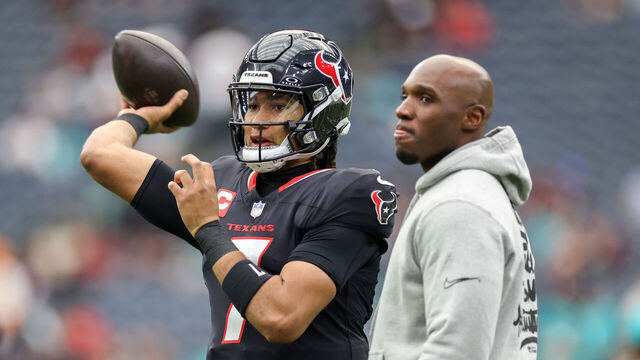 HOUSTON, TEXAS - DECEMBER 15: C.J. Stroud #7 of the Houston Texans warms up before the game against the Miami Dolphins at NRG Stadium on December 15, 2024 in Houston, Texas.