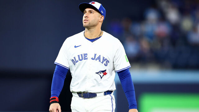 TORONTO, ONTARIO - OCTOBER 20: George Springer #4 of the Toronto Blue Jays looks on before game seven of the American League Championship Series against the Seattle Mariners at the Rogers Centre on October 20, 2025 in Toronto, Ontario.