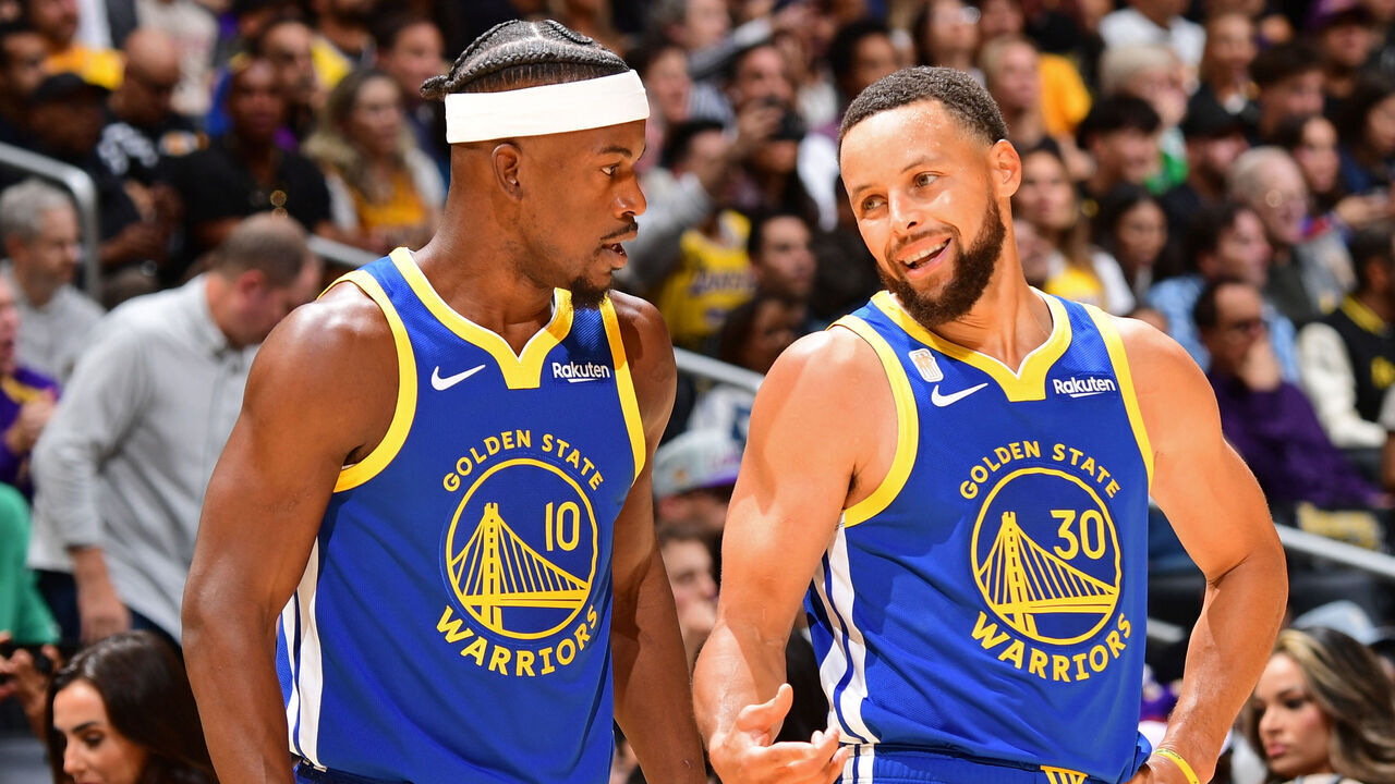 LOS ANGELES, CA - OCTOBER 21: Jimmy Butler III #10 and Stephen Curry #30 talks before the game against the Los Angeles Lakers on October 21, 2025 at Crypto.Com Arena in Los Angeles, California. NOTE TO USER: User expressly acknowledges and agrees that, by downloading and/or using this Photograph, user is consenting to the terms and conditions of the Getty Images License Agreement. Mandatory Copyright Notice: Copyright 2025 NBAE