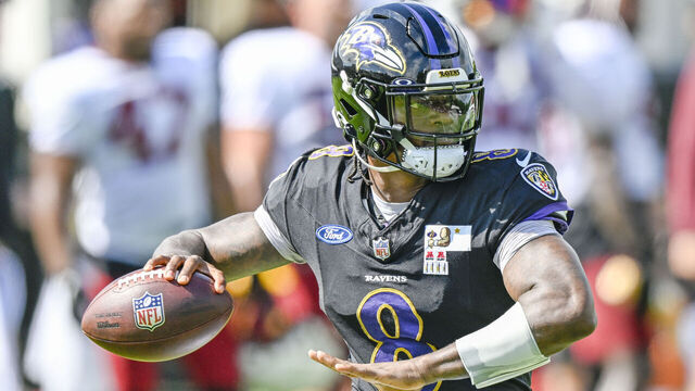 OWINGS MILLS, MD - AUGUST 15: Baltimore Ravens quarterback Lamar Jackson (8) throws during a joint practice with the Washington Commanders at the Ravens training facility on August 15, 2023.