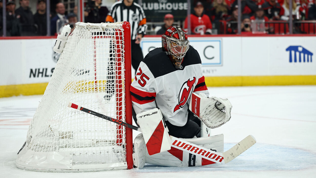 RALEIGH, NORTH CAROLINA - OCTOBER 09: Jacob Markstrom #25 of the New Jersey Devils protects the net during the second period of the game against the Carolina Hurricanes at Lenovo Center on October 09, 2025 in Raleigh, North Carolina.