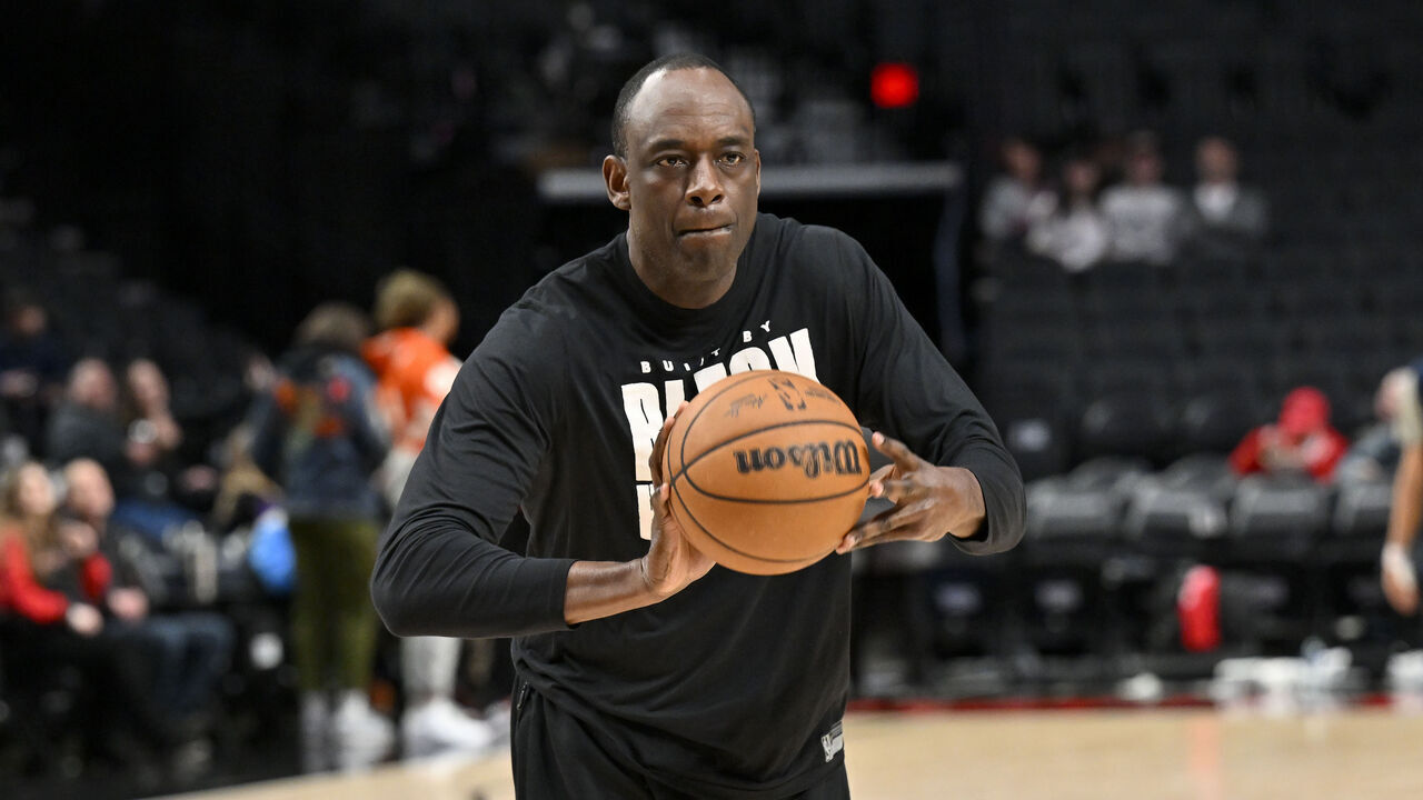 PORTLAND, OREGON - APRIL 09: Assistant coach Roy Rogers of the Portland Trail Blazers helps players warm up before the game \V| at the Moda Center on April 09, 2024 in Portland, Oregon.