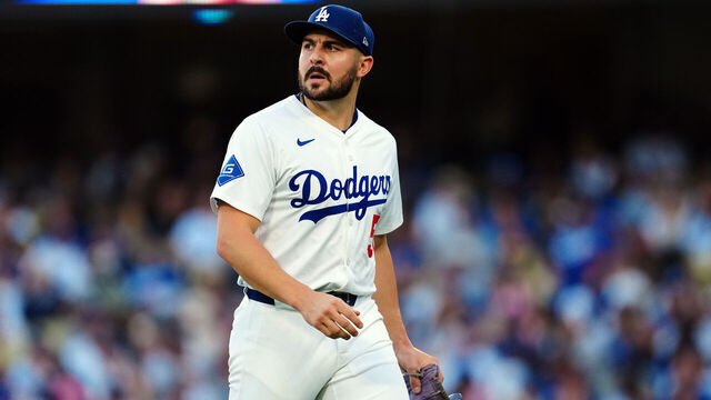 LOS ANGELES, CA - OCTOBER 16: Alex Vesia #51 of the Los Angeles Dodgers walks back to the dugout during Game Three of the National League Championship Series presented by loanDepot between the Milwaukee Brewers and the Los Angeles Dodgers at Dodger Stadium on Thursday, October 16, 2025 in Los Angeles, California.
