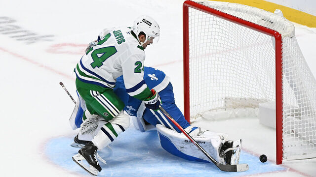 DENVER, COLORADO - OCTOBER 23: Seth Jarvis #24 of the Carolina Hurricanes scores in a penalty shootout against the Colorado Avalanche at Ball Arena on October 23, 2025 in Denver, Colorado.
