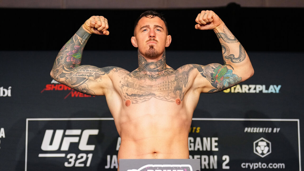ABU DHABI, UNITED ARAB EMIRATES - OCTOBER 24: Tom Aspinall of England poses on the scale during the UFC 321 official weigh-ins at Hilton Abu Dhabi Yas Island on October 24, 2025 in Abu Dhabi, United Arab Emirates.