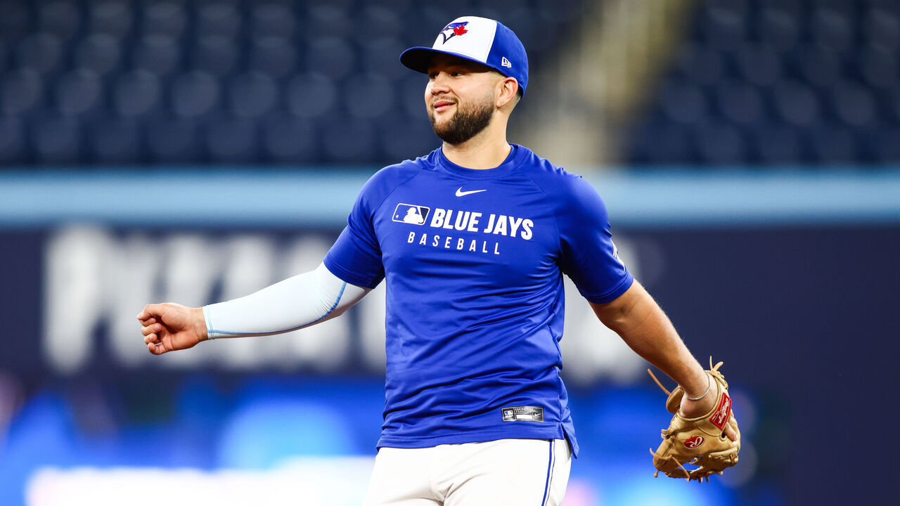TORONTO, CANADA - OCTOBER 23: Bo Bichette #11 of the Toronto Blue Jays works out in the infield during World Series Workout Day ahead of Game 1 of the World Series at Rogers Centre on October 23, 2025 in Toronto, Ontario, Canada.