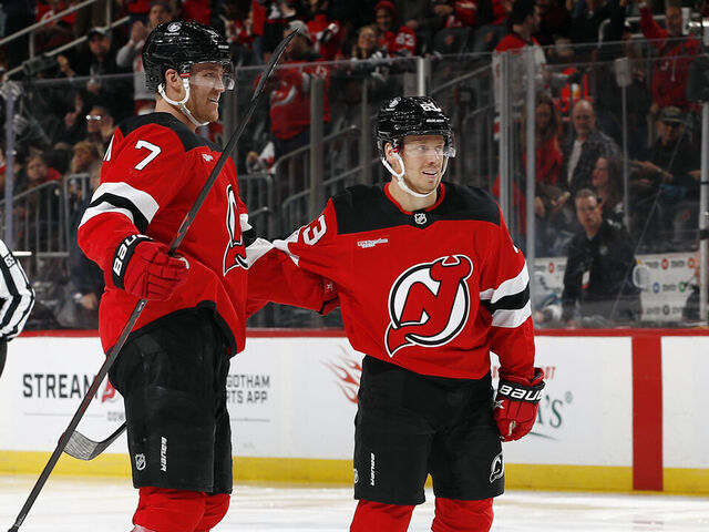 NEWARK, NEW JERSEY - OCTOBER 24: Jesper Bratt #63 celebrates with Dougie Hamilton #7 of the New Jersey Devils after Hamilton's goal during the second period against the San Jose Sharks at Prudential Center on October 24, 2025 in Newark, New Jersey.