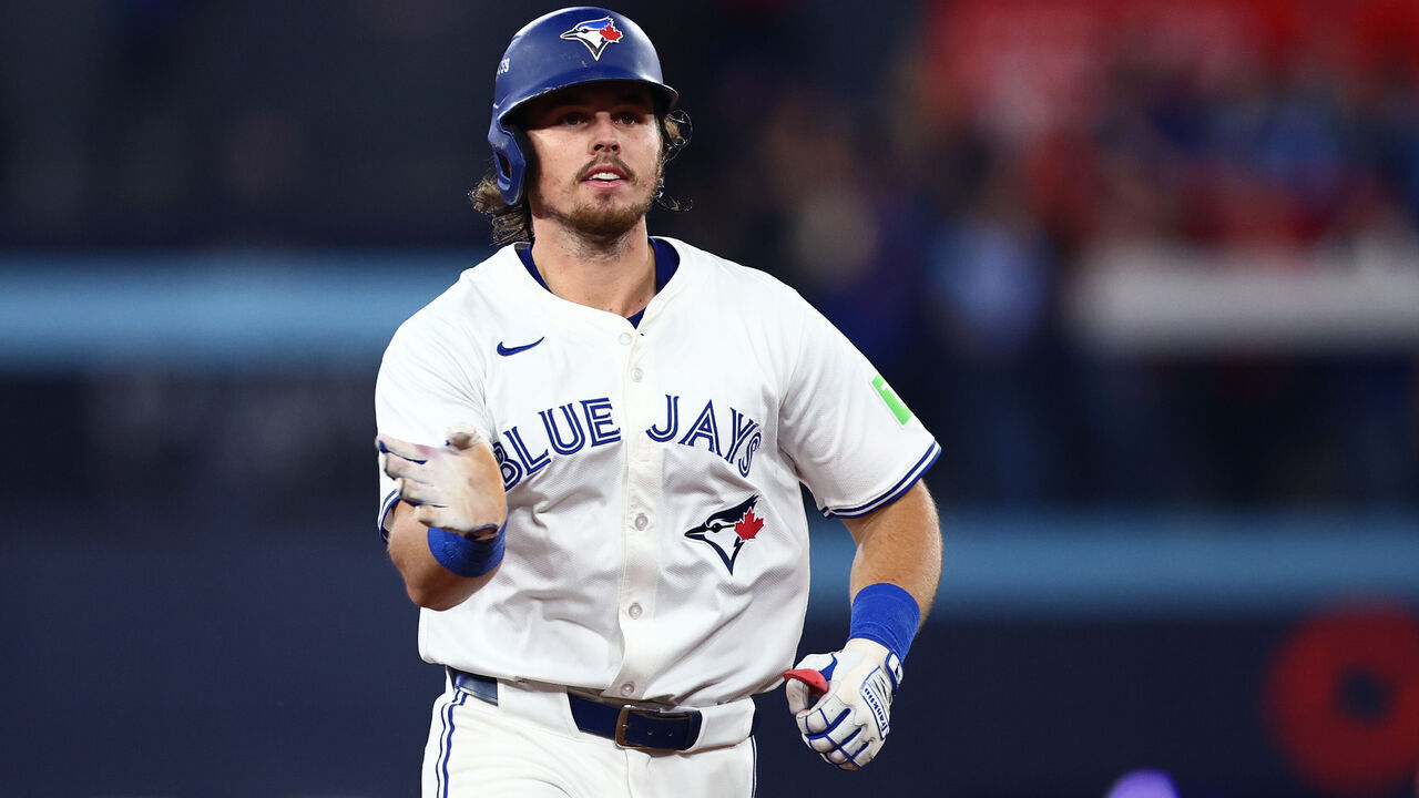 TORONTO, ONTARIO - OCTOBER 19: Addison Barger #47 of the Toronto Blue Jays rounds the bases after hitting a two-run home run against the Seattle Mariners during the third inning in game six of the American League Championship Series at Rogers Centre on October 19, 2025 in Toronto, Ontario.
