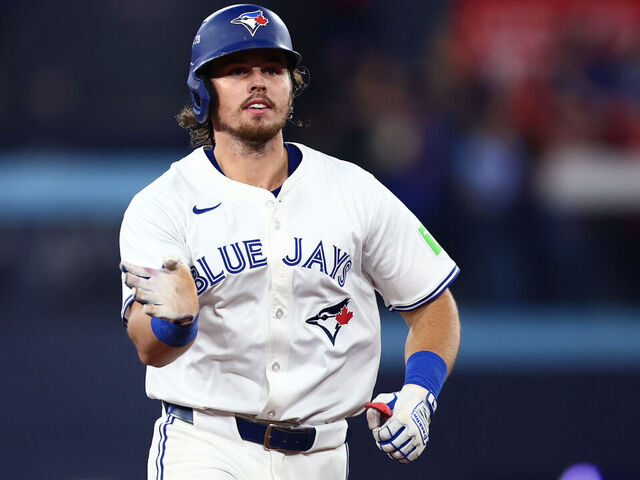 TORONTO, ONTARIO - OCTOBER 19: Addison Barger #47 of the Toronto Blue Jays rounds the bases after hitting a two-run home run against the Seattle Mariners during the third inning in game six of the American League Championship Series at Rogers Centre on October 19, 2025 in Toronto, Ontario.