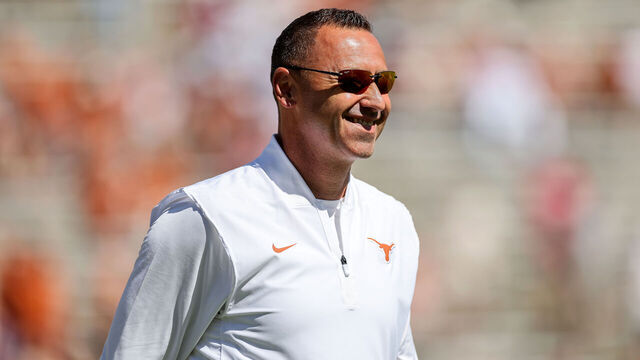 DALLAS, TEXAS - OCTOBER 11: Head coach Steve Sarkisian of the Texas Longhorns watches players warm up before the game against the Oklahoma Sooners at Cotton Bowl on October 11, 2025 in Dallas, Texas.