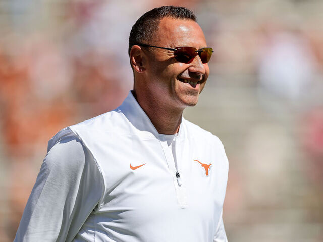 DALLAS, TEXAS - OCTOBER 11: Head coach Steve Sarkisian of the Texas Longhorns watches players warm up before the game against the Oklahoma Sooners at Cotton Bowl on October 11, 2025 in Dallas, Texas.