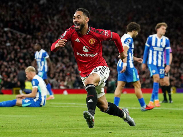 Manchester United's Matheus Cunha celebrates scoring their side's first goal during the Premier League match at Old Trafford, Manchester. Picture date: Saturday October 25, 2025.