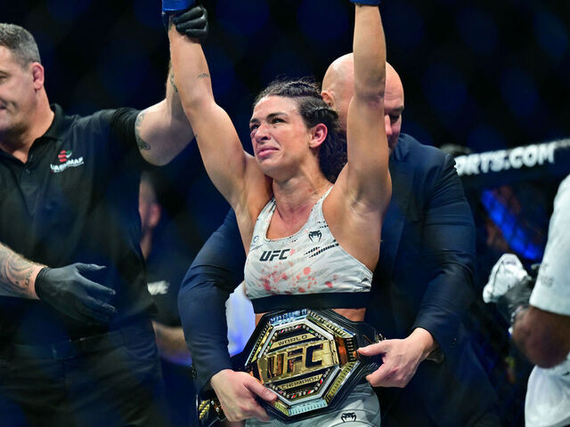 TOPSHOT - Brazilian-American Mackenzie Dern reacts after defeating Brazil's Virna Jandiroba during their strawweight bout at UFC 321 at Etihad Arena in Abu Dhabi early on October 26, 2025.
