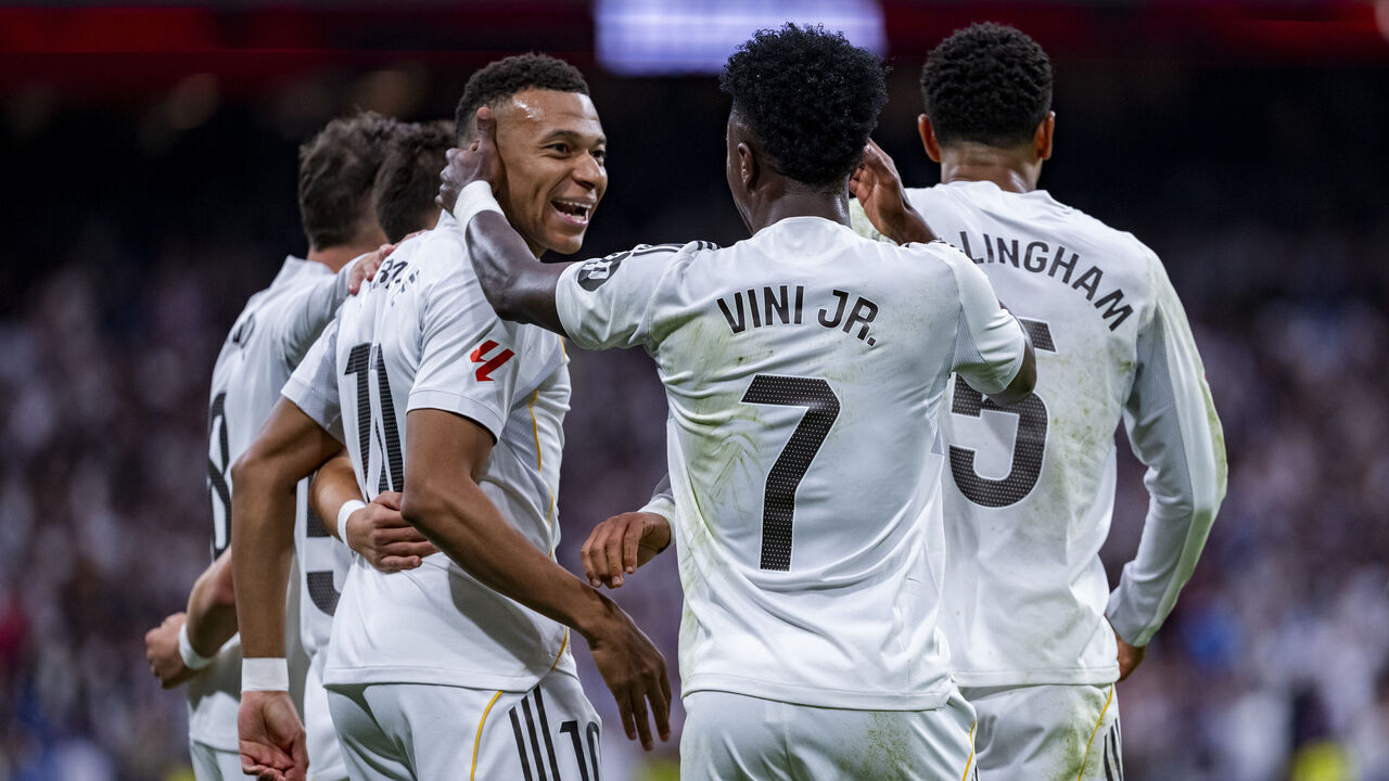 Players of Real Madrid (from left to right) Arda Guler, Kylian Mbappe, Vinicius Junior, and Jude Bellingham celebrate a goal during the LaLiga EA Sports football match between Real Madrid CF and FC Barcelona at Estadio Santiago Bernabeu in Madrid, Spain, on October 26, 2025.