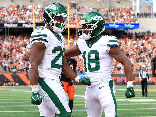 CINCINNATI, OHIO - OCTOBER 26: Breece Hall #20 and Isaiah Williams #18 of the New York Jets celebrate after Hall's rushing touchdown during the fourth quarter against the Cincinnati Bengals in the game at Paycor Stadium on October 26, 2025 in Cincinnati, Ohio.