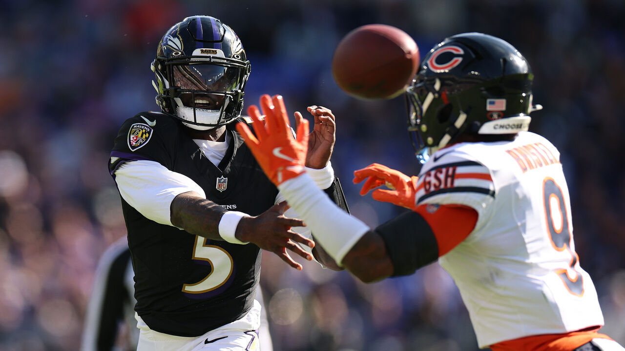 BALTIMORE, MARYLAND - OCTOBER 26: Tyler Huntley #5 of the Baltimore Ravens makes a pass against Jaquan Brisker #9 of the Chicago Bears in the second quarter of the game at M&T Bank Stadium on October 26, 2025 in Baltimore, Maryland.