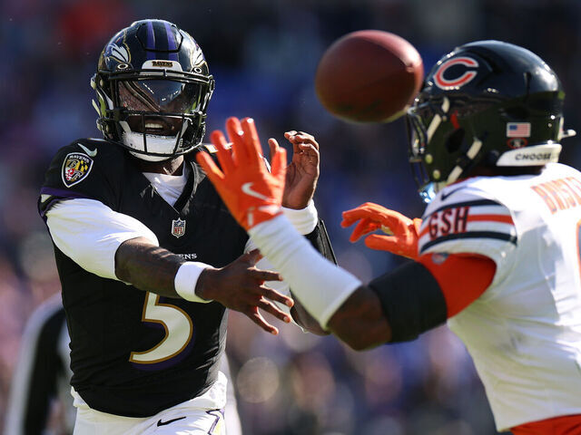 BALTIMORE, MARYLAND - OCTOBER 26: Tyler Huntley #5 of the Baltimore Ravens makes a pass against Jaquan Brisker #9 of the Chicago Bears in the second quarter of the game at M&T Bank Stadium on October 26, 2025 in Baltimore, Maryland.