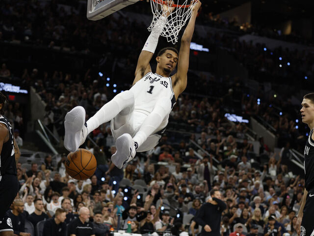 SAN ANTONIO, TX - OCTOBER 26: Victor Wembanyama #1 of the San Antonio Spurs dunks against the Brooklyn Nets in first half of a game at Frost Bank Center on October 26, 2025 in San Antonio, Texas. NOTE TO USER: User expressly acknowledges and agrees that, by downloading and or using this photograph, User is consenting to terms and conditions of the Getty Images License Agreement.