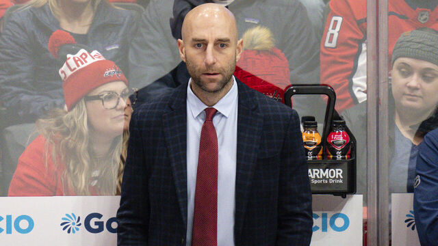 WASHINGTON, DC - JANUARY 10: Washington Capitals assistant coach Mitch Love looks on during the first period of a game against the Montreal Canadiens at Capital One Arena on January 10, 2025 in Washington, D.C.