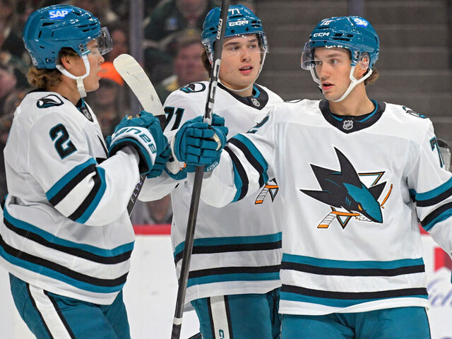 SAINT PAUL, MN - OCTOBER 26: San Jose Sharks forward William Eklund (72) celebrates his power play goal with San Jose Sharks forward Will Smith (2) and San Jose Sharks forward Macklin Celebrini (71) during the first period of a NHL game between the Minnesota Wild and San Jose Sharks on October 26, 2025, at Grand Casino Arena in Saint Paul, MN.