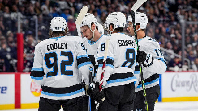 WINNIPEG, MANITOBA - OCTOBER 26: The Utah Mammoth celebrate a goal during the second period against the Winnipeg Jets at Canada Life Centre on October 26, 2025 in Winnipeg, Manitoba.