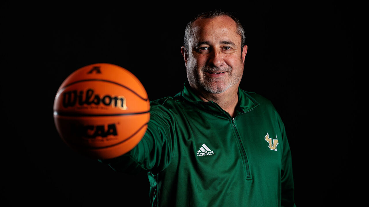 ARLINGTON, TEXAS - OCTOBER 13: Jose Fernandez head coach of the University of South Florida poses for a photo during the American Athletic Conference Basketball Media day at The Westin Irving Convention Center at Las Colinas on October 13, 2024 in Irving, Texas.