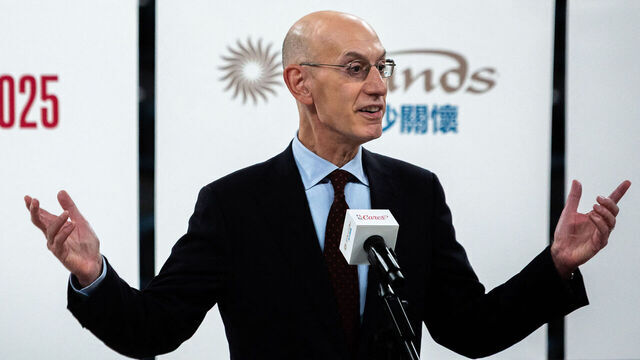 Commissioner of the NBA Adam Silver delivers a speech ahead of the NBA pre-season basketball games, at the Venetian Arena in Macau on October 9, 2025. The NBA returns to the lucrative China market this week with two pre-season games following a six-year absence after a team official tweeted his support for pro-democracy protests in Hong Kong. The Brooklyn Nets and the Phoenix Suns will play sell-out games on October 10 and October 12 in Macau, a special administrative region of China close to Hong Kong.
