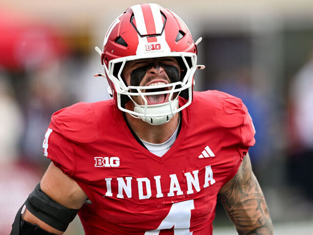 BLOOMINGTON, IN - OCTOBER 25: Indiana Hoosiers LB Aiden Fisher (4) celebrates an interception return for a touchdown during a college football game between the UCLA Bruins and Indiana Hoosiers on October 25, 2025 at Memorial Stadium in Bloomington, IN