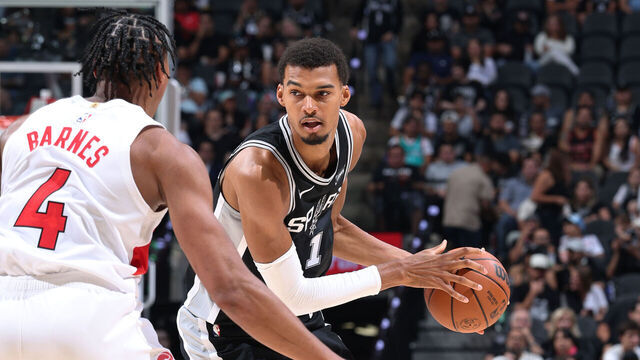 SAN ANTONIO, TX - OCTOBER 27: Victor Wembanyama #1 of the San Antonio Spurs looks to pass the ball during the game against the Toronto Raptors on October 27, 2025 at the Frost Bank Center in San Antonio, Texas. Mandatory Copyright Notice: Copyright 2025 NBAE (Photos by Jeff Haynes/NBAE via Getty Images)