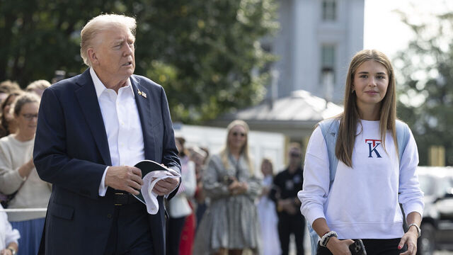 WASHINGTON, DC - SEPTEMBER 26: U.S. President Donald Trump, joined by his granddaughter Kai Trump, departs the White House on September 26, 2025 in Washington, DC. Under pressure from Trump, the DOJ indicted former FBI Director James Comey on counts of making false statements and obstruction of a congressional proceeding related to the September 2020 Russia investigation.