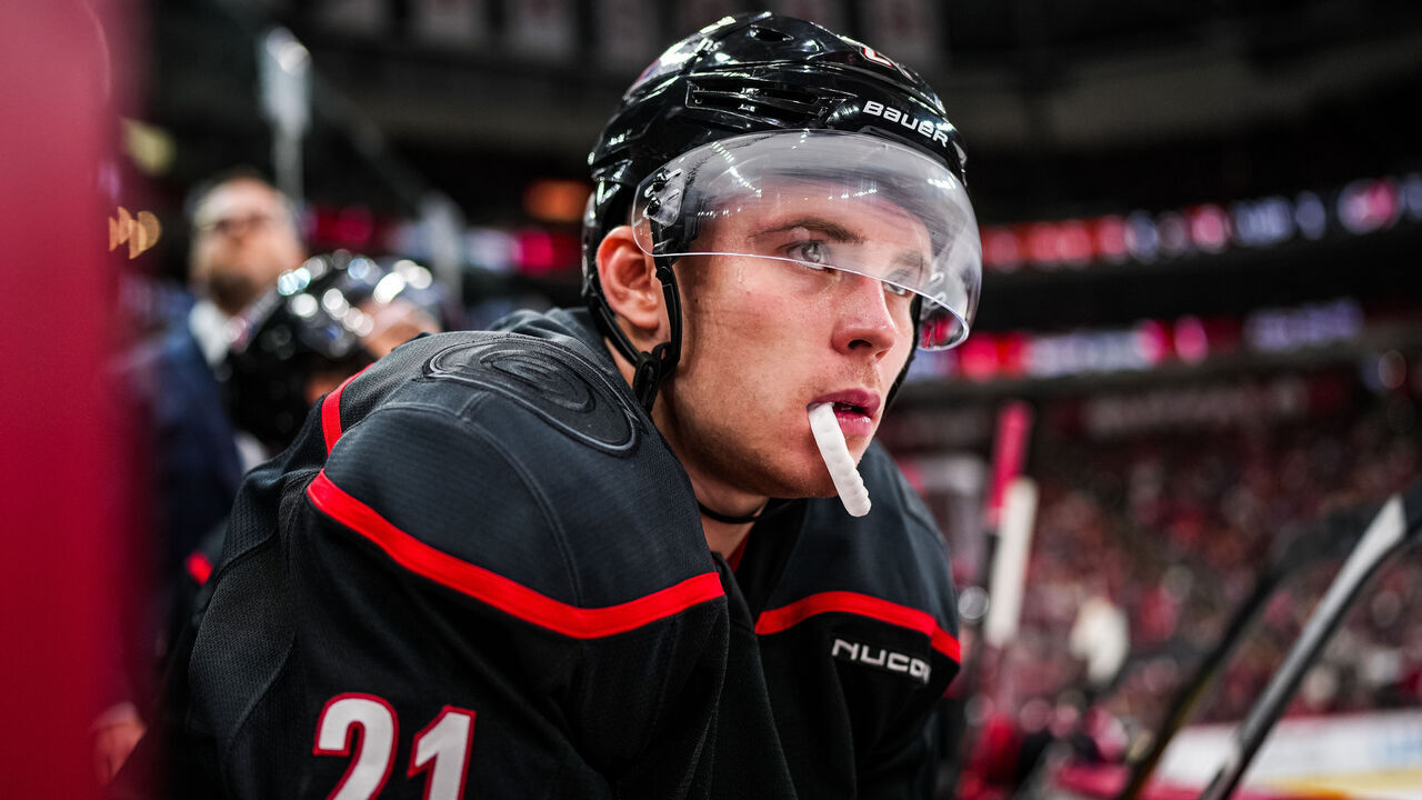 RALEIGH, NORTH CAROLINA - OCTOBER 11: Alexander Nikishin #21 of the Carolina Hurricanes looks on during the second period against the Philadelphia Flyers at Lenovo Center on October 11, 2025 in Raleigh, North Carolina.