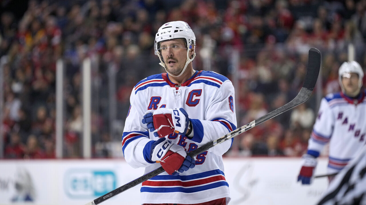 CALGARY, CANADA - OCTOBER 26: J.T. Miller #8 of the New York Rangers skates during a break in play against the Calgary Flames at the Scotiabank Saddledome on October 26, 2025, in Calgary, Alberta, Canada.