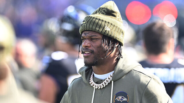 BALTIMORE, MARYLAND - OCTOBER 26: Lamar Jackson #8 of the Baltimore Ravens looks on from the sideline prior to the first quarter of the game against the Chicago Bears at M&T Bank Stadium on October 26, 2025 in Baltimore, Maryland.