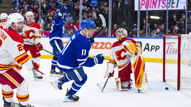 TORONTO, CANADA - OCTOBER 28: Max Domi #11 of the Toronto Maple Leafs scores a goal during the third period against the Calgary Flames at the Scotiabank Arena on October 28, 2025 in Toronto, Ontario, Canada.