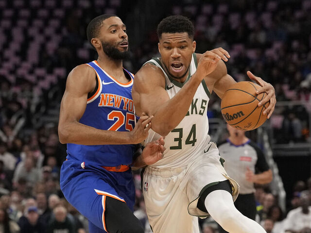 MILWAUKEE, WISCONSIN - OCTOBER 28: Giannis Antetokounmpo #34 of the Milwaukee Bucks dribbles the ball against Mikal Bridges #25 of the New York Knicks during the first quarter at Fiserv Forum on October 28, 2025 in Milwaukee, Wisconsin.