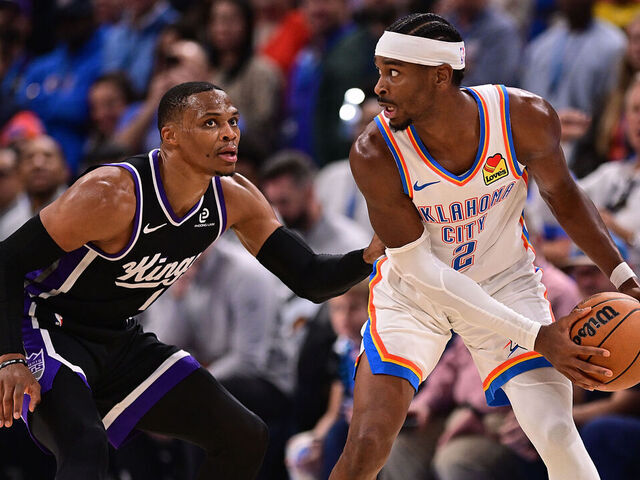 OKLAHOMA CITY, OKLAHOMA - OCTOBER 28: Shai Gilgeous-Alexander #2 of the Oklahoma City Thunder looks for an opening against Russell Westbrook #18 of the Sacramento Kings during the second half at Paycom Center on October 28, 2025 in Oklahoma City, Oklahoma.
