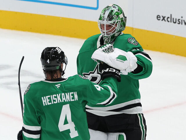 DALLAS, TEXAS - OCTOBER 28: Jake Oettinger #29 of the Dallas Stars celebrates with Miro Heiskanen #4 after defeating the Washington Capitals at American Airlines Center on October 28, 2025 in Dallas, Texas.