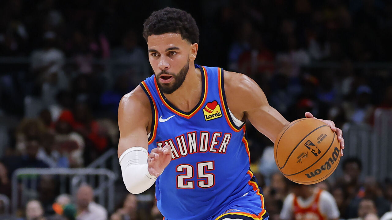 ATLANTA, GEORGIA - OCTOBER 25: Ajay Mitchell #25 of the Oklahoma City Thunder drives to the basket during the fourth quarter against the Atlanta Hawks at State Farm Arena on October 25, 2025 in Atlanta, Georgia.