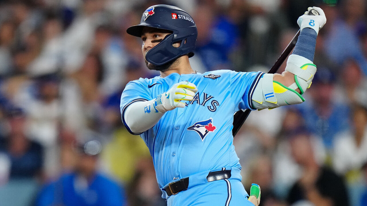 LOS ANGELES, CA - OCTOBER 28: Bo Bichette #11 of the Toronto Blue Jays hits an RBI single in the seventh inning during Game Four of the 2025 World Series presented by Capital One between the Toronto Blue Jays and the Los Angeles Dodgers at Dodger Stadium on Tuesday, October 28, 2025 in Los Angeles, California.