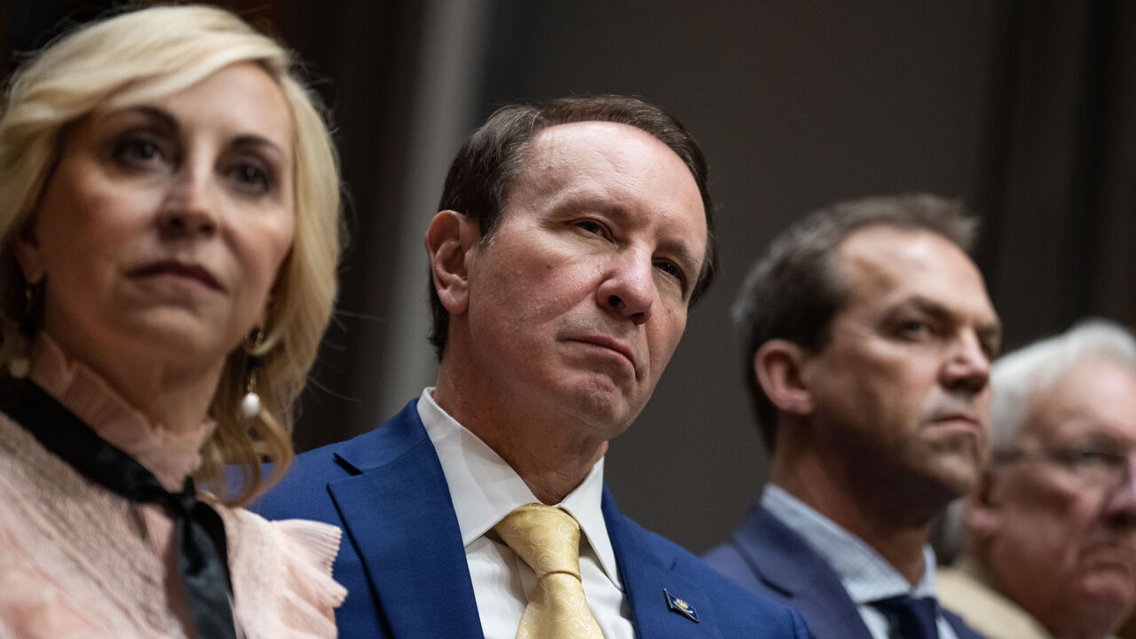 UNITED STATES - JANUARY 17: Louisiana Governor Jeff Landry, and his wife, Sharon, left, listen to testimony by South Dakota Gov. Kristi Noem, President-elect Donald Trump's nominee to be Homeland Security secretary, during her Senate Homeland Security and Governmental Affairs Committee confirmation hearing in Dirksen building on Friday, January 17, 2025. (Tom Williams/CQ-Roll Call, Inc via Getty Images)
