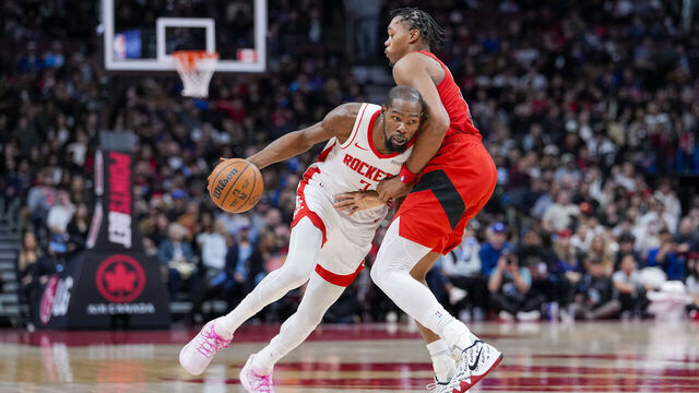 TORONTO, CANADA - OCTOBER 29: Kevin Durant #7 of the Houston Rockets dribbles against Scottie Barnes #4 of the Toronto Raptors during the second half at Scotiabank Arena on October 29, 2025 in Toronto, Canada.